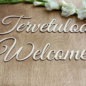 Tervetuloa/Welcome- vaneriteksti